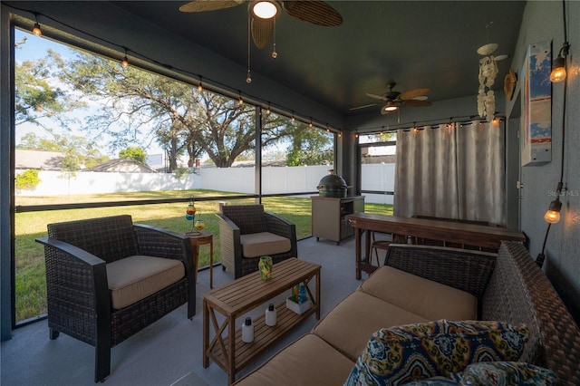 sunroom / solarium with ceiling fan