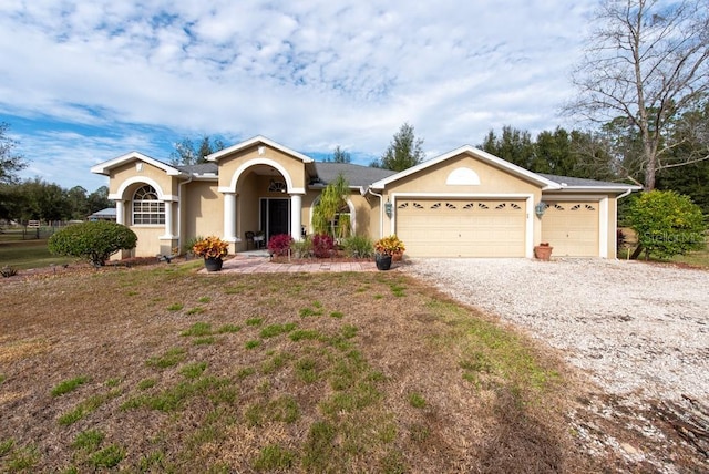 ranch-style home with a garage