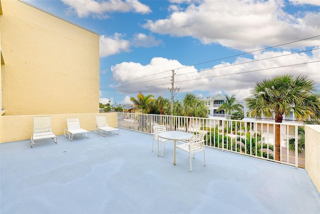 view of patio / terrace with a balcony