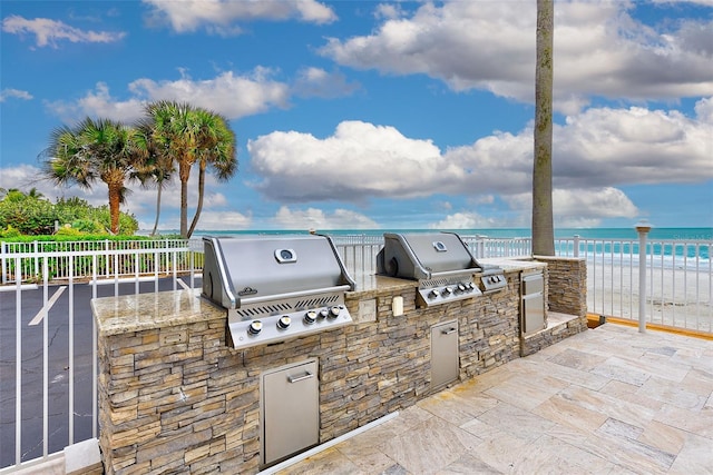 16308 Gulf Blvd Unit 303, Redington Beach, FL 33708 - view of patio featuring view of water and beach