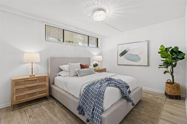 bedroom featuring hardwood / wood-style floors