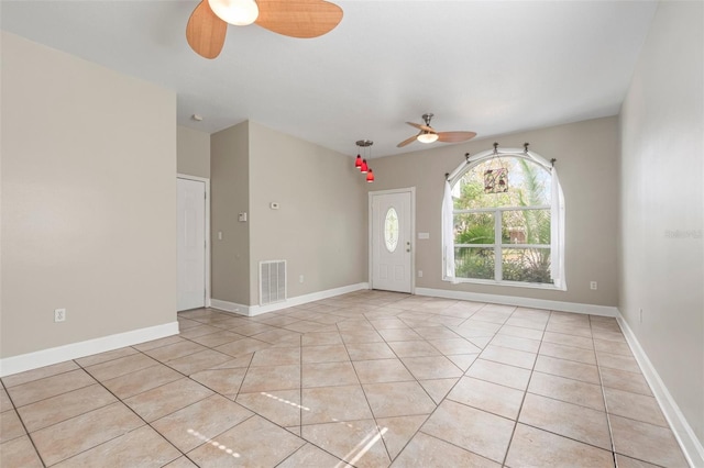 empty room featuring light tile patterned floors