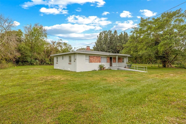 exterior space with a lawn