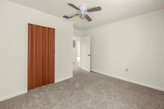 505 Sawyer Ave, Merritt Island, FL 32953 - carpeted spare room with crown molding, a ceiling fan, and baseboards