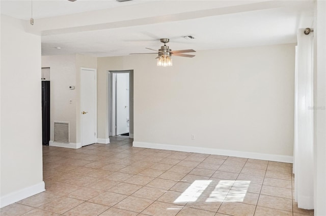 unfurnished room featuring ceiling fan and light tile patterned flooring