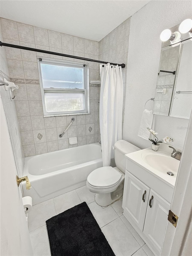 full bathroom with tile patterned flooring, vanity, toilet, and shower / bath combo with shower curtain