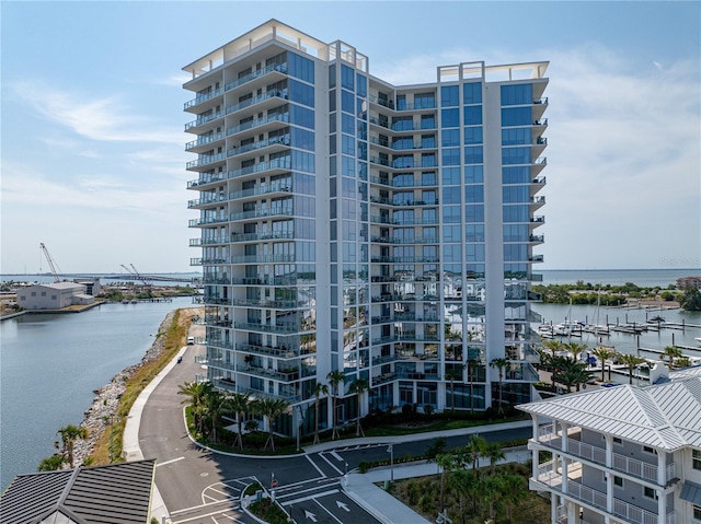 view of building exterior with a water view