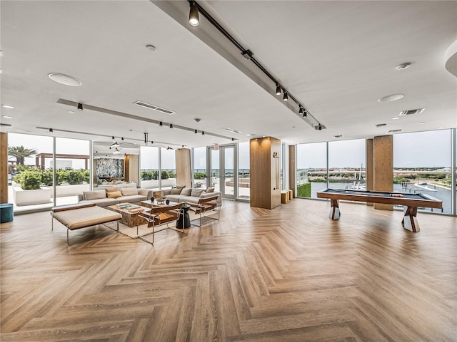 building lobby featuring a water view