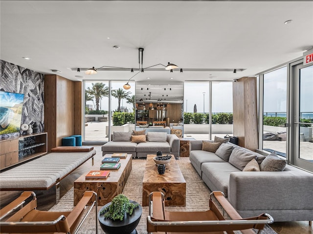 living room with floor to ceiling windows