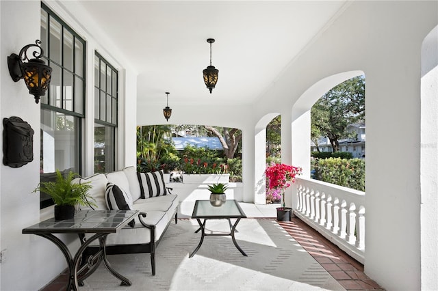 view of patio with outdoor lounge area and a porch