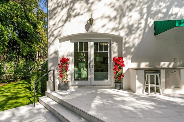 doorway to property with french doors and a patio