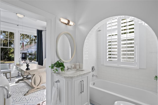 bathroom featuring vanity and a bathing tub