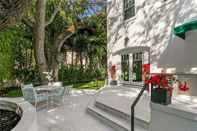 view of patio featuring french doors