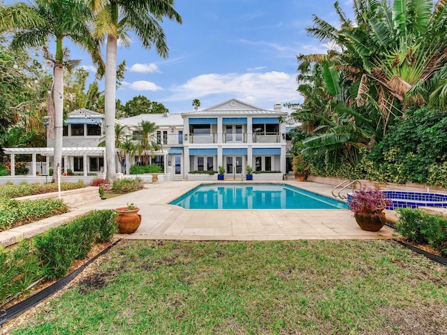 view of swimming pool with a pergola and a patio