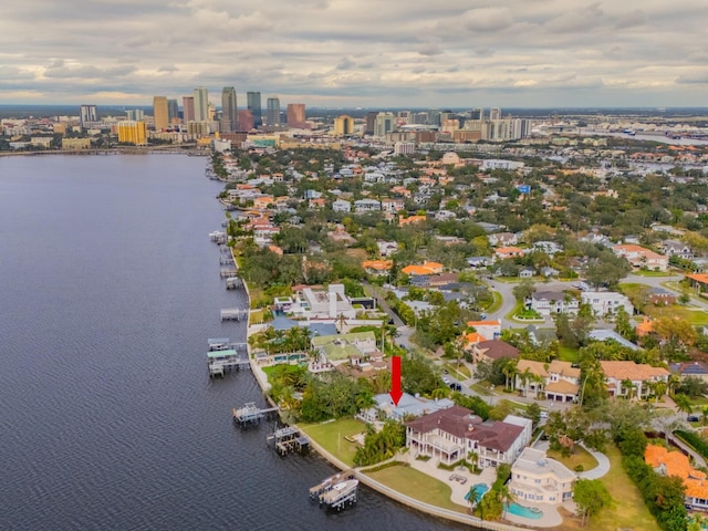 birds eye view of property featuring a water view