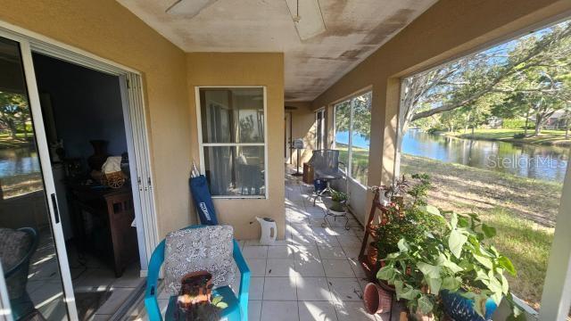 view of patio with a water view