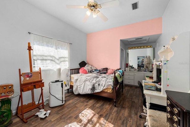 bedroom featuring ceiling fan and dark hardwood / wood-style floors