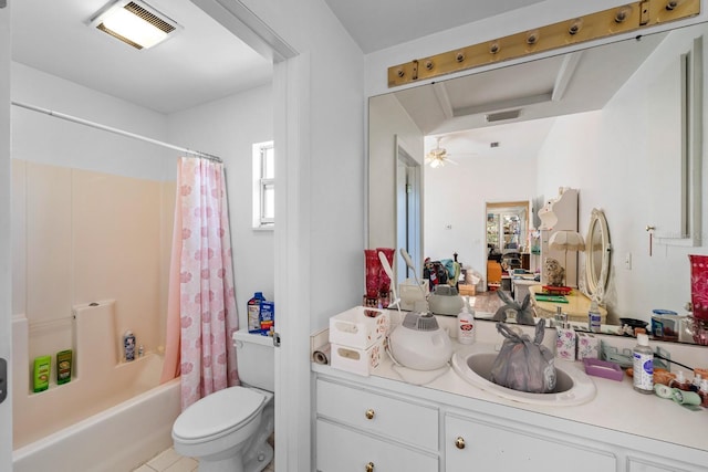 full bathroom with ceiling fan, shower / bath combo, tile patterned flooring, toilet, and vanity