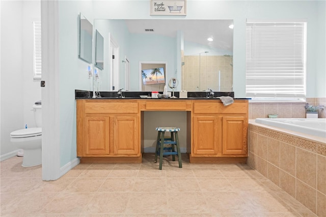 full bathroom featuring plus walk in shower, tile patterned flooring, vanity, and toilet