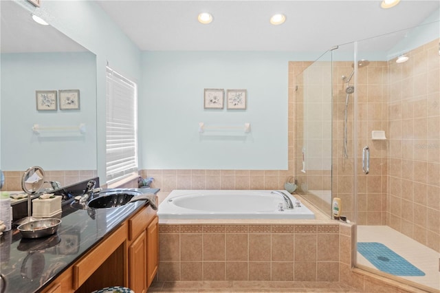 bathroom with vanity and plus walk in shower