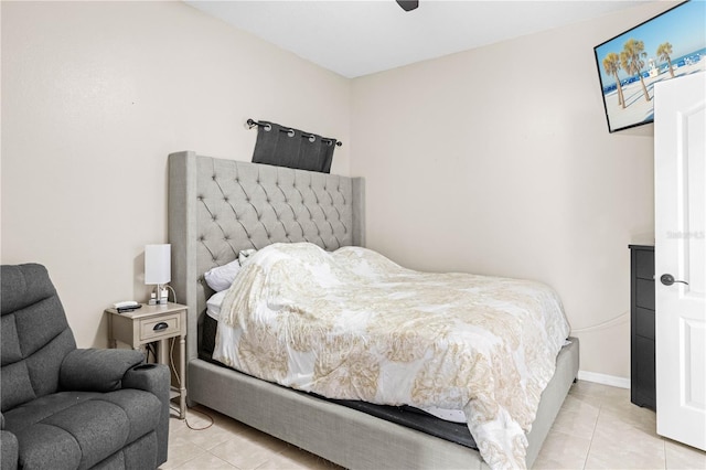 bedroom featuring ceiling fan and light tile patterned floors