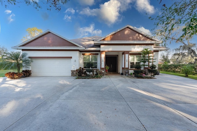 view of front of property featuring a garage