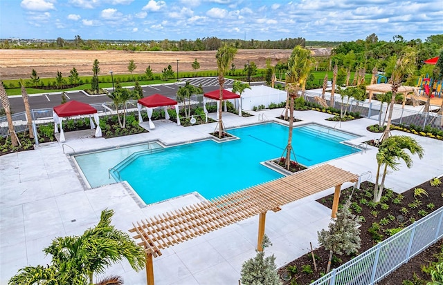 view of swimming pool featuring a gazebo, a pergola, and a patio