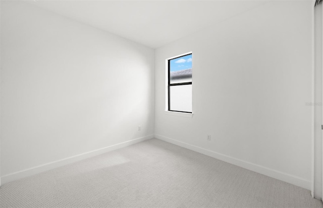 empty room with carpet flooring