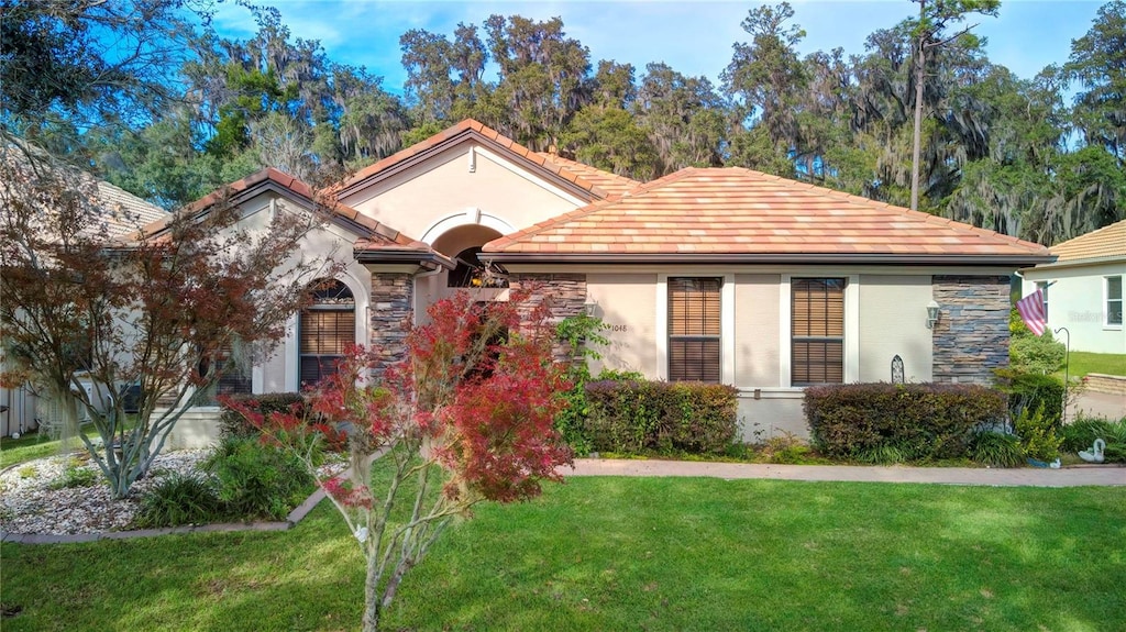 view of front of home with a front yard