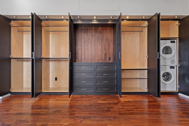 closet with stacked washing maching and dryer