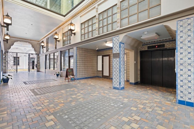 405 Central Ave Unit 700, Saint Petersburg, FL 33701 - lobby featuring a high ceiling and wallpapered walls
