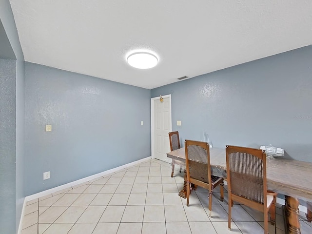 view of tiled dining room