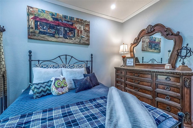 bedroom featuring crown molding