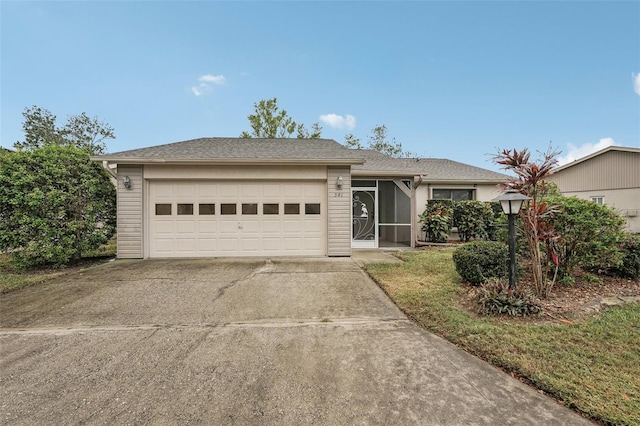 ranch-style house featuring a garage