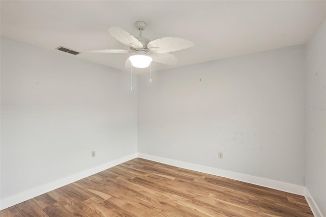 unfurnished room featuring ceiling fan and light hardwood / wood-style floors