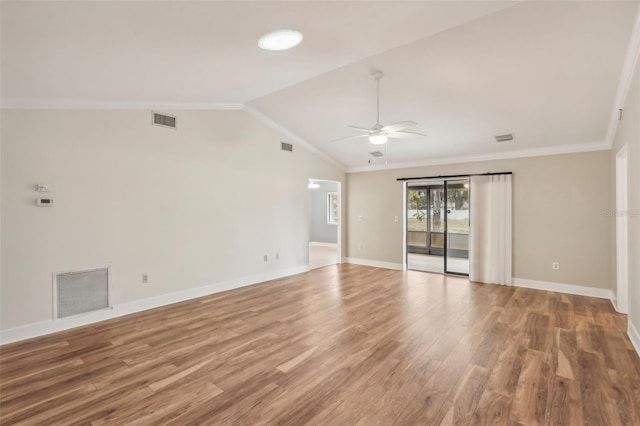 unfurnished room featuring ceiling fan, ornamental molding, lofted ceiling, and hardwood / wood-style flooring