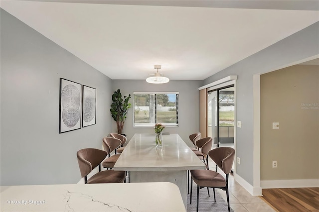 dining room with light hardwood / wood-style floors