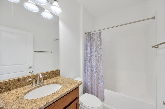 full bathroom with vanity, toilet, and shower / tub combo with curtain