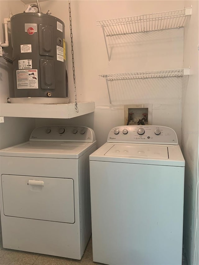 clothes washing area featuring washer and dryer