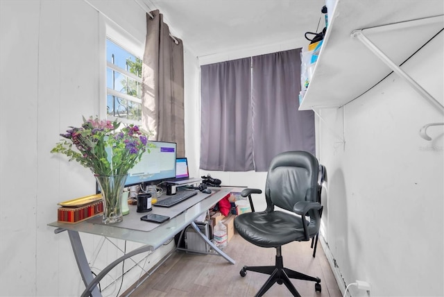 office with hardwood / wood-style floors