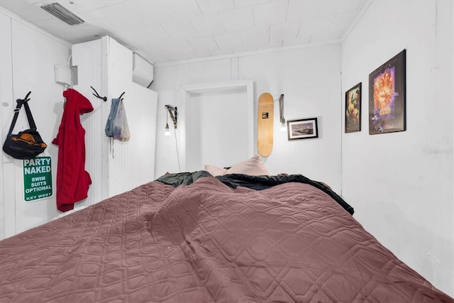 bedroom featuring ornamental molding