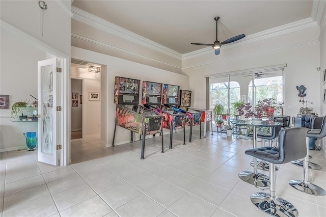 misc room featuring light tile patterned floors, ceiling fan, and ornamental molding