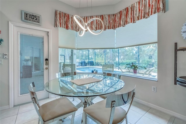 dining space with light tile patterned flooring