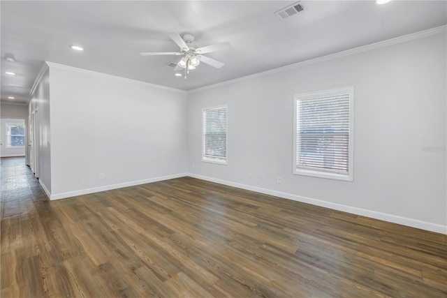 unfurnished room with ceiling fan, ornamental molding, and dark hardwood / wood-style floors