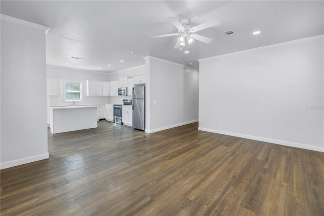 unfurnished living room with crown molding, dark hardwood / wood-style floors, and ceiling fan