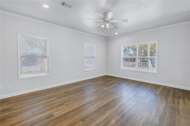 unfurnished room featuring crown molding, ceiling fan, and dark hardwood / wood-style flooring