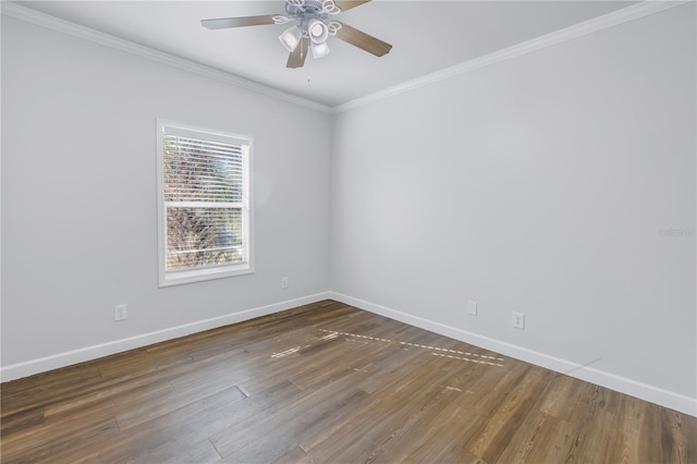 unfurnished room with ceiling fan, ornamental molding, and dark hardwood / wood-style floors