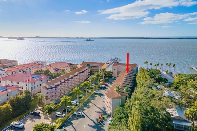 drone / aerial view with a water view