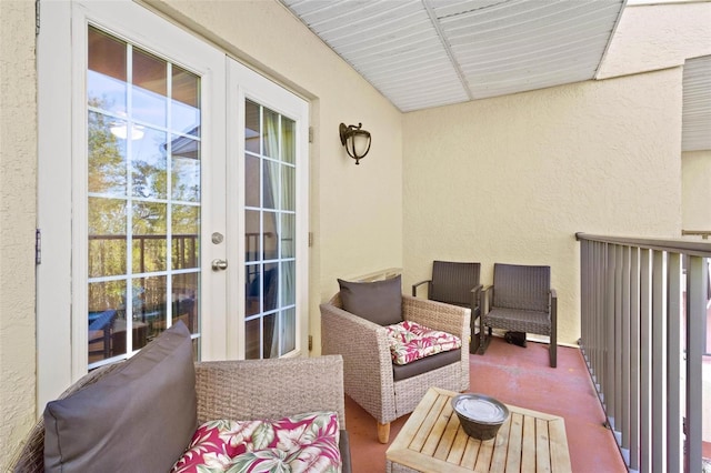 balcony featuring french doors