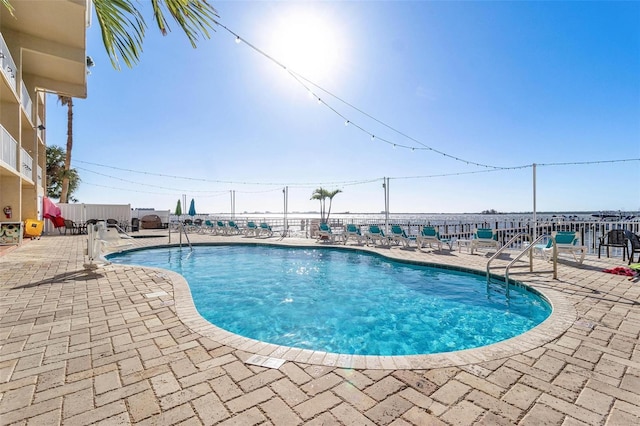 view of swimming pool featuring a patio